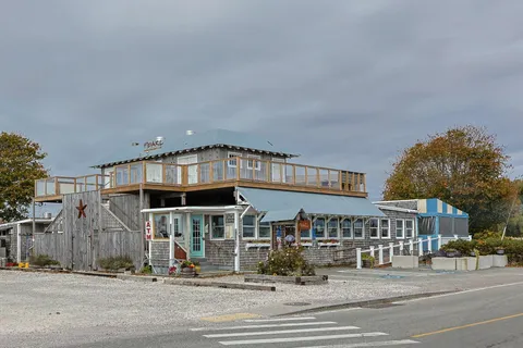 a front view of a building with street