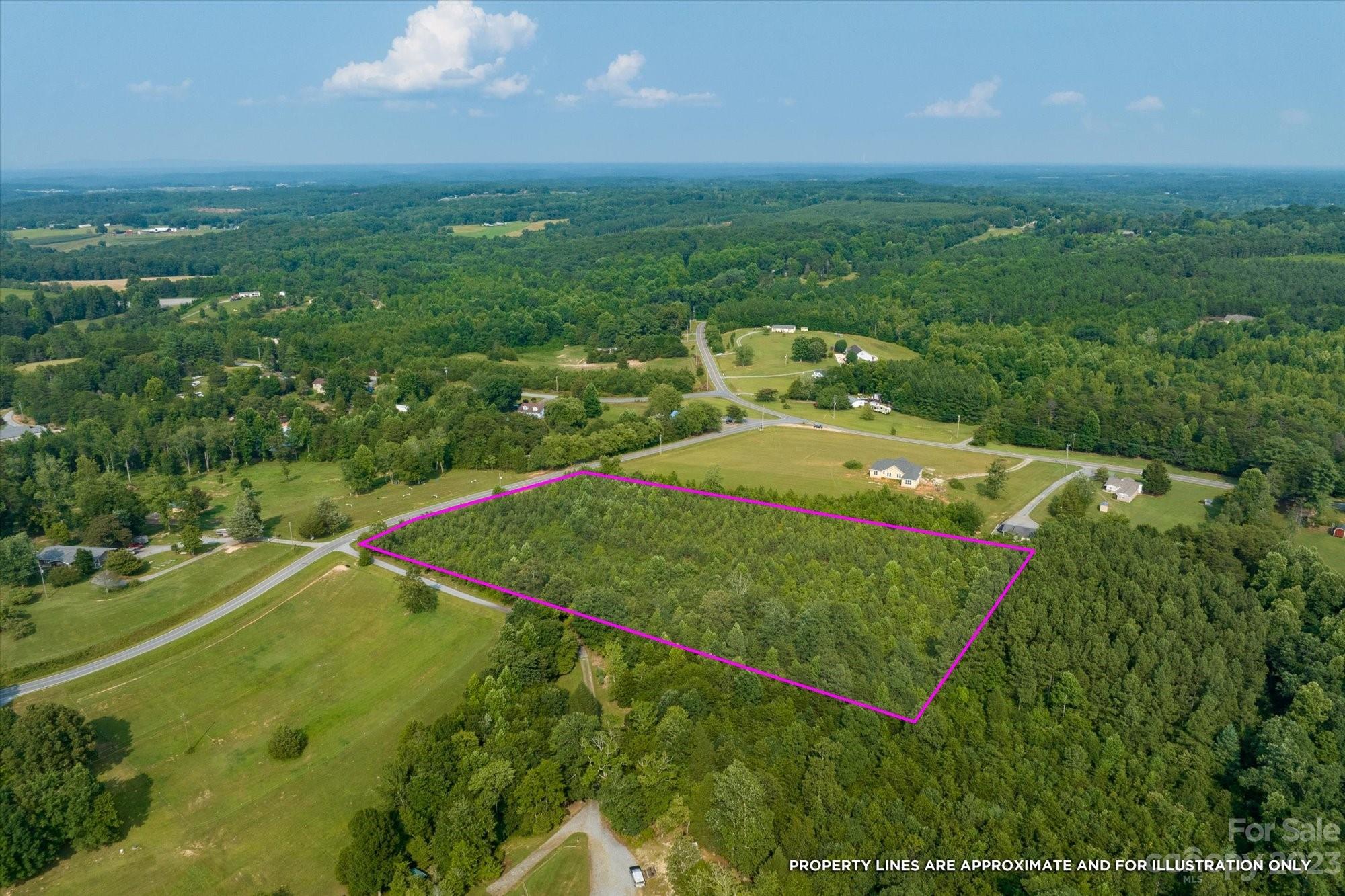 0 Bill Collins Road Tryon, NC 28782 - Photo 3 of 11 an aerial view of residential houses with outdoor space and trees