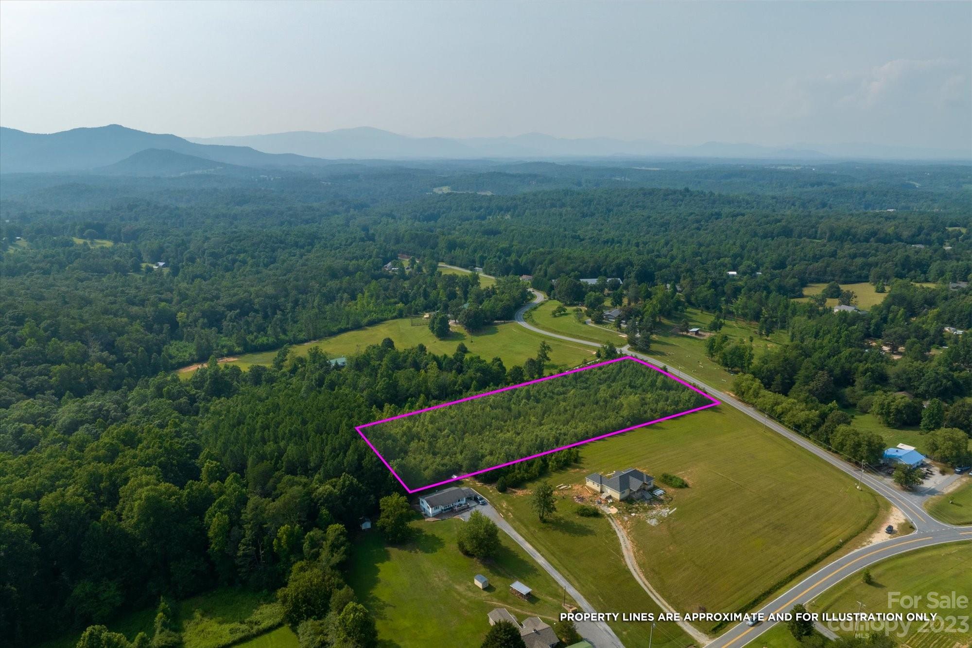 0 Bill Collins Road Tryon, NC 28782 - Photo 4 of 11 an aerial view of a tennis court