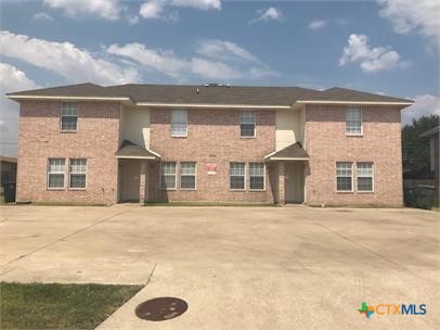 5709 Redstone Drive Killeen, TX 76543 - Photo 1 of 1 front view of a house with a yard
