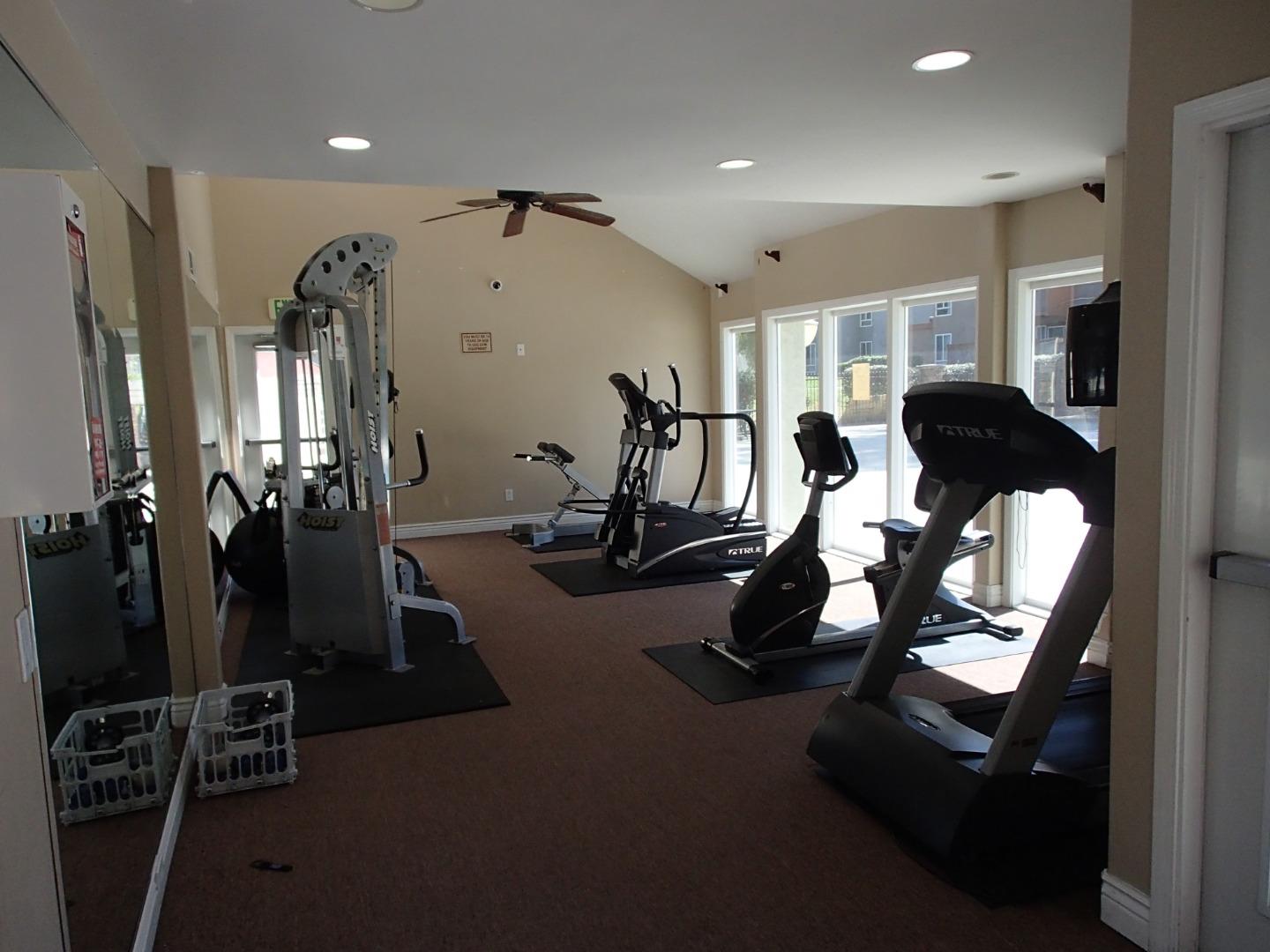 496 Dempsey Road, Unit 199 Milpitas, CA 95035 - Photo 31 of 41 a room with gym equipment and windows