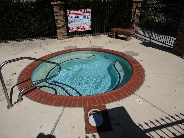 a view of swimming pool with a sitting space