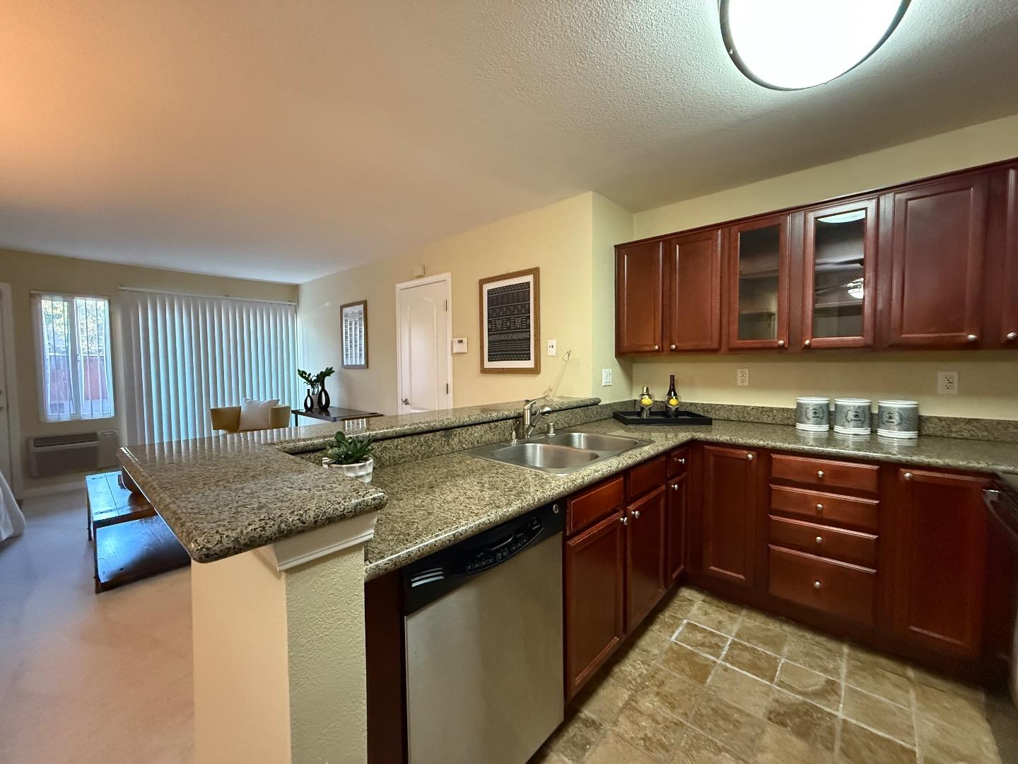 496 Dempsey Road, Unit 199 Milpitas, CA 95035 - Photo 5 of 41 a kitchen with a sink and cabinets