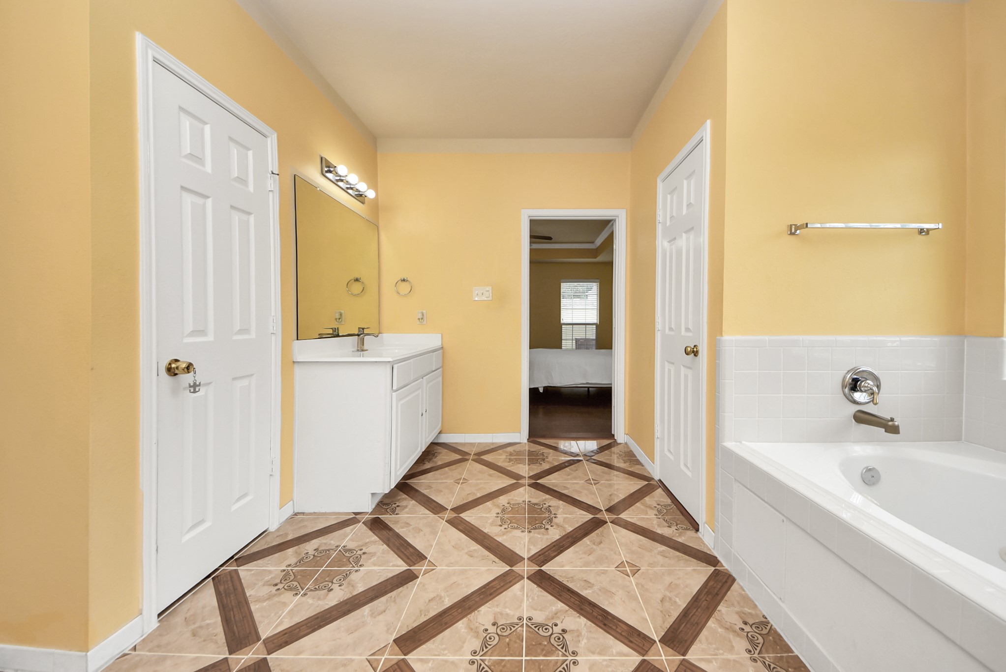 14103 Imperial Wood Lane Rosharon, TX 77583 - Photo 18 of 36 Expansive en-suite bathroom with jetted soaking tub and separate shower