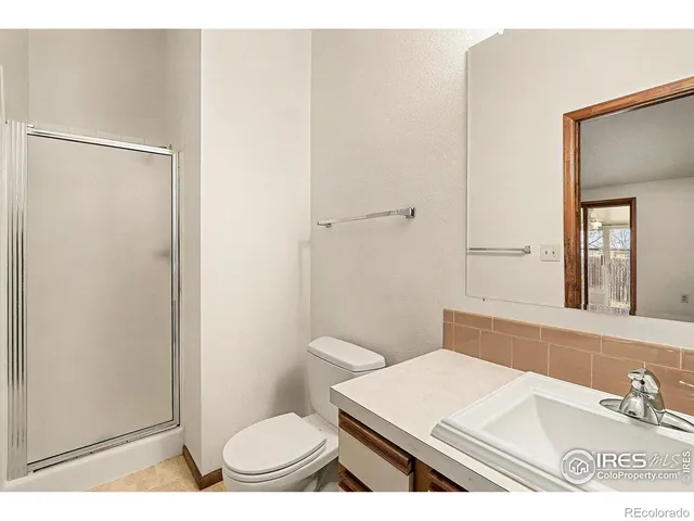 a view of a house with backyard and balcony