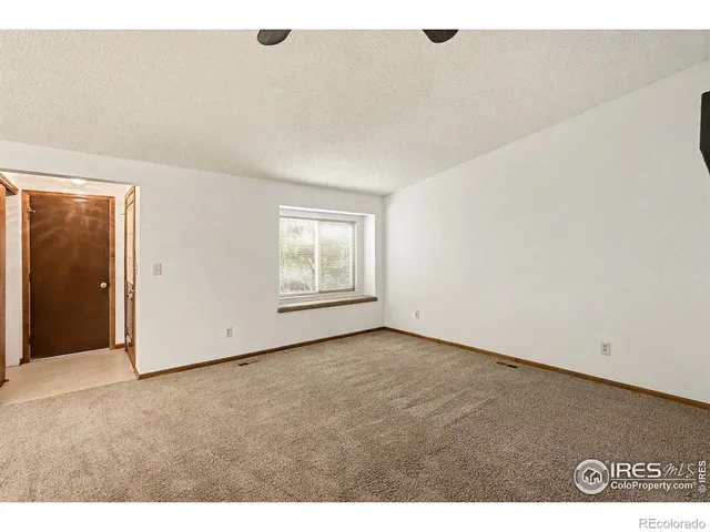 a view of a kitchen with a sink