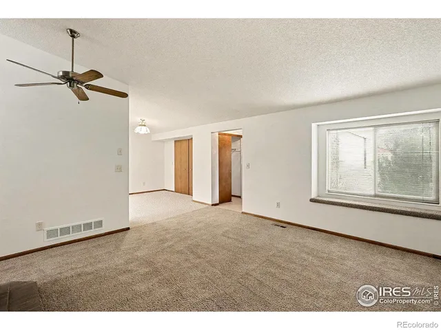 a kitchen with stainless steel appliances a refrigerator and a stove