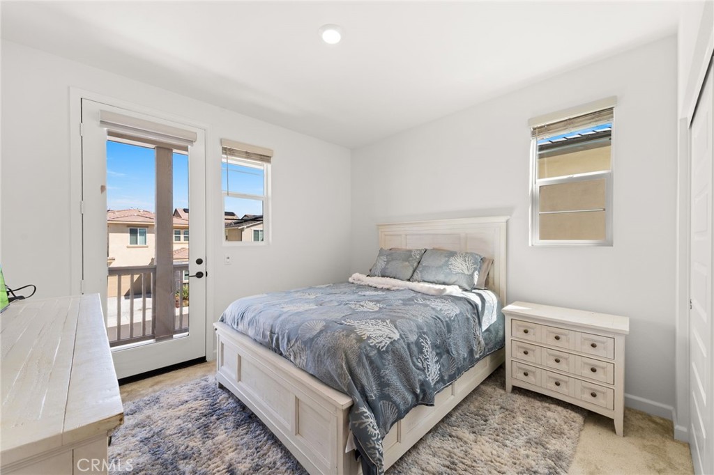 32259 Hillstone Street Temecula, CA 92591 - Photo 32 of 62 a bedroom with a bed and a window