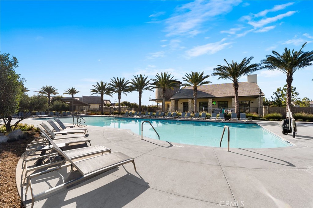 32259 Hillstone Street Temecula, CA 92591 - Photo 48 of 62 a view of a swimming pool with chairs
