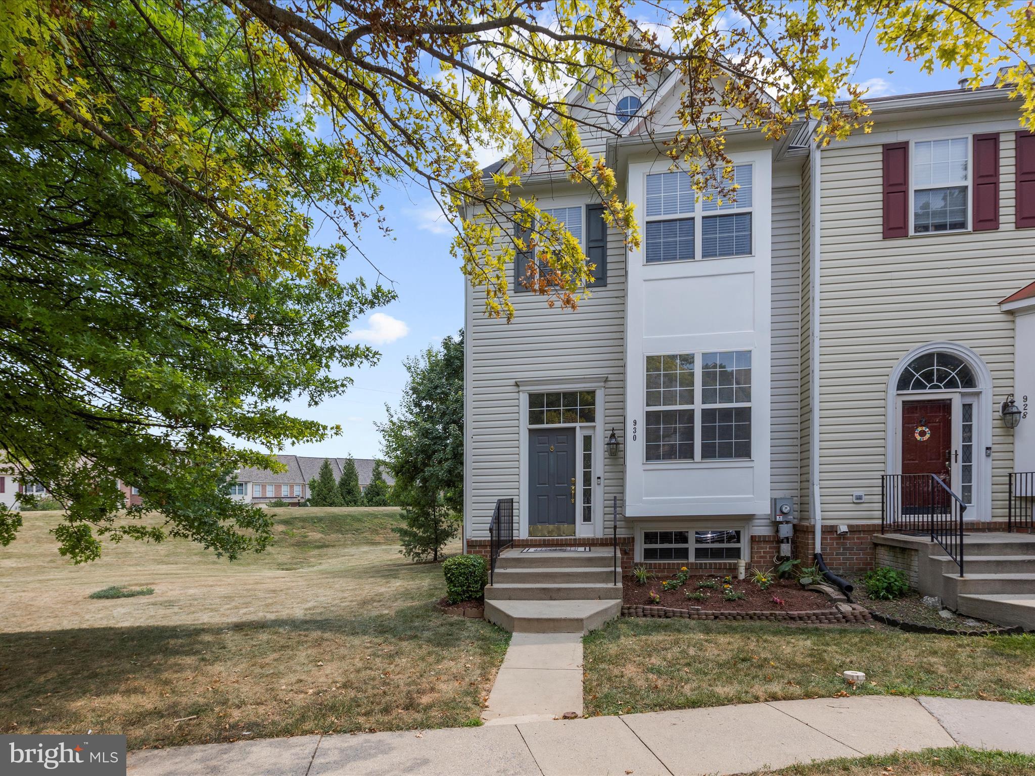 930 Mosby Drive Frederick, MD 21701 - Photo 1 of 52 a front view of a house with garden