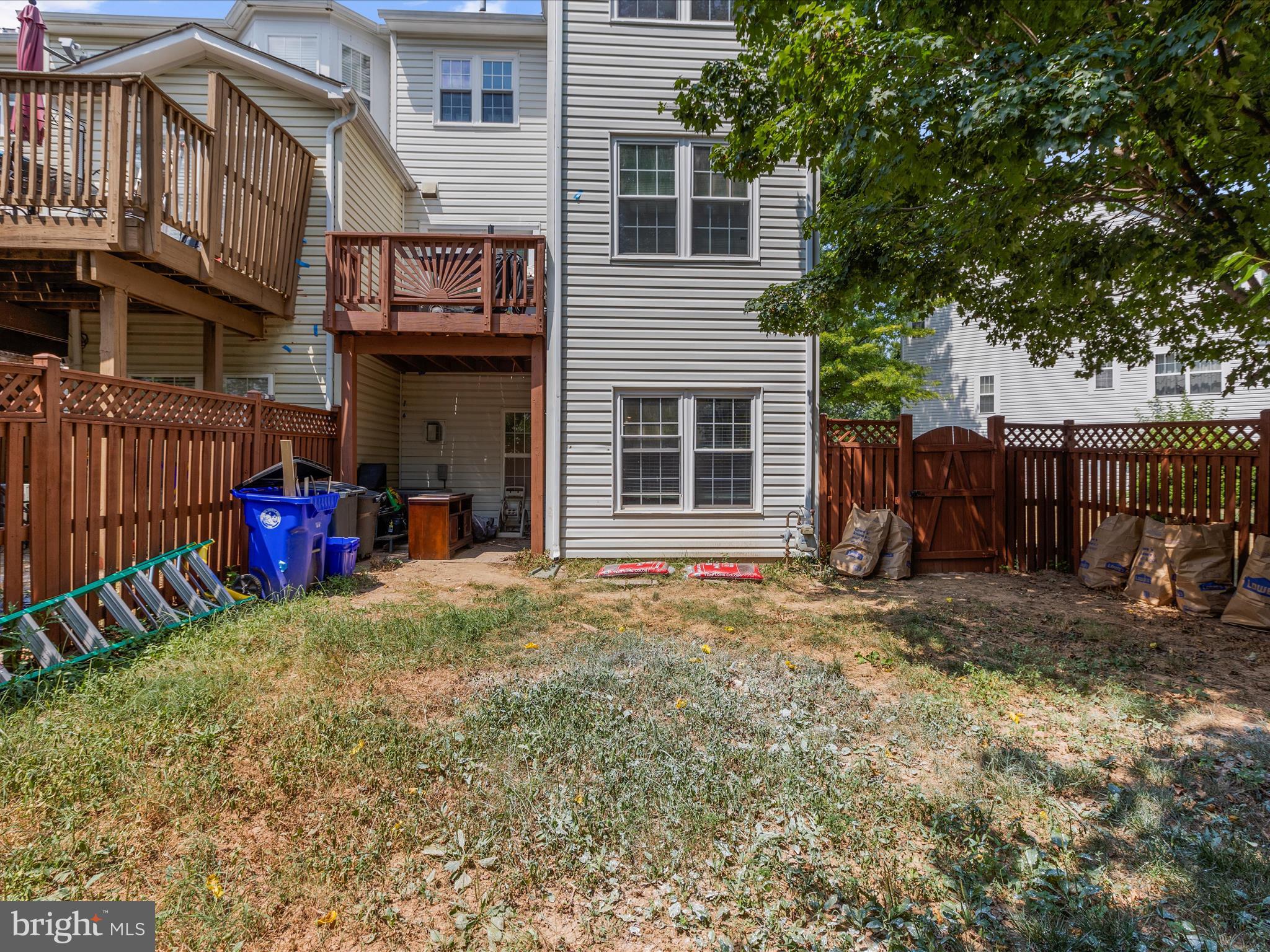930 Mosby Drive Frederick, MD 21701 - Photo 48 of 52 a view of a house with a backyard and a tree