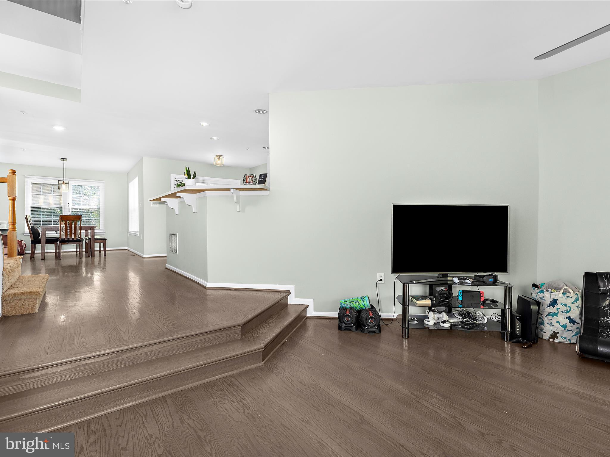 930 Mosby Drive Frederick, MD 21701 - Photo 5 of 52 a view of a livingroom with furniture and a flat screen tv