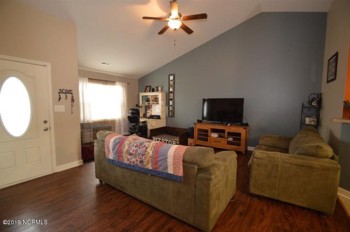 308 Sinclair Lane Hubert, NC 28539 - Photo 4 of 13 308 sinclair living room 2