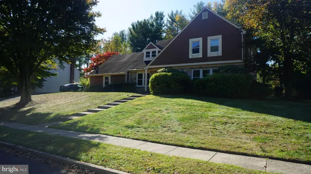 a house view with a garden space