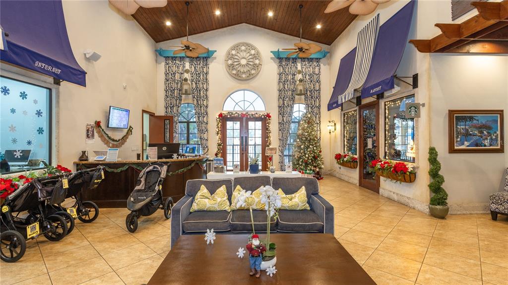 2977 Buccaneer Palm Road Kissimmee, FL 34747 - Photo 53 of 66 a living room with fireplace furniture and a large window