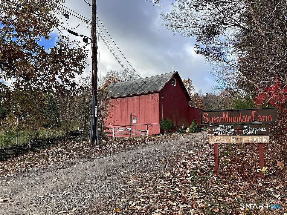 2581 Litchfield Road Watertown, CT 06795 - Photo 12 of 26 a view of a house with a yard and tree