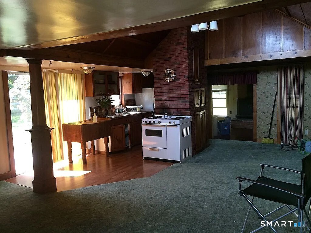 2581 Litchfield Road Watertown, CT 06795 - Photo 10 of 26 a kitchen with stainless steel appliances granite countertop a stove refrigerator and cabinets