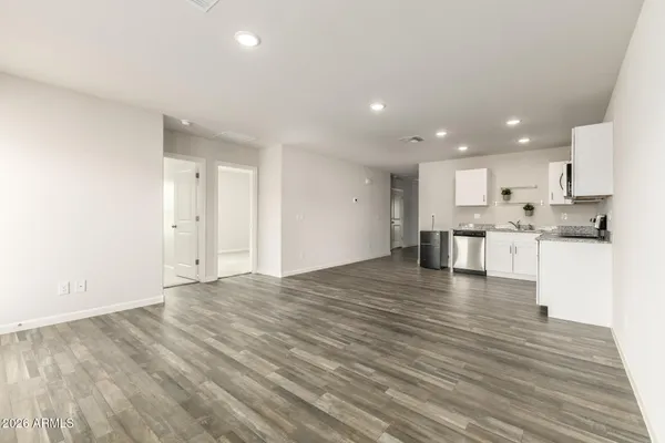 a view of kitchen with wooden floor