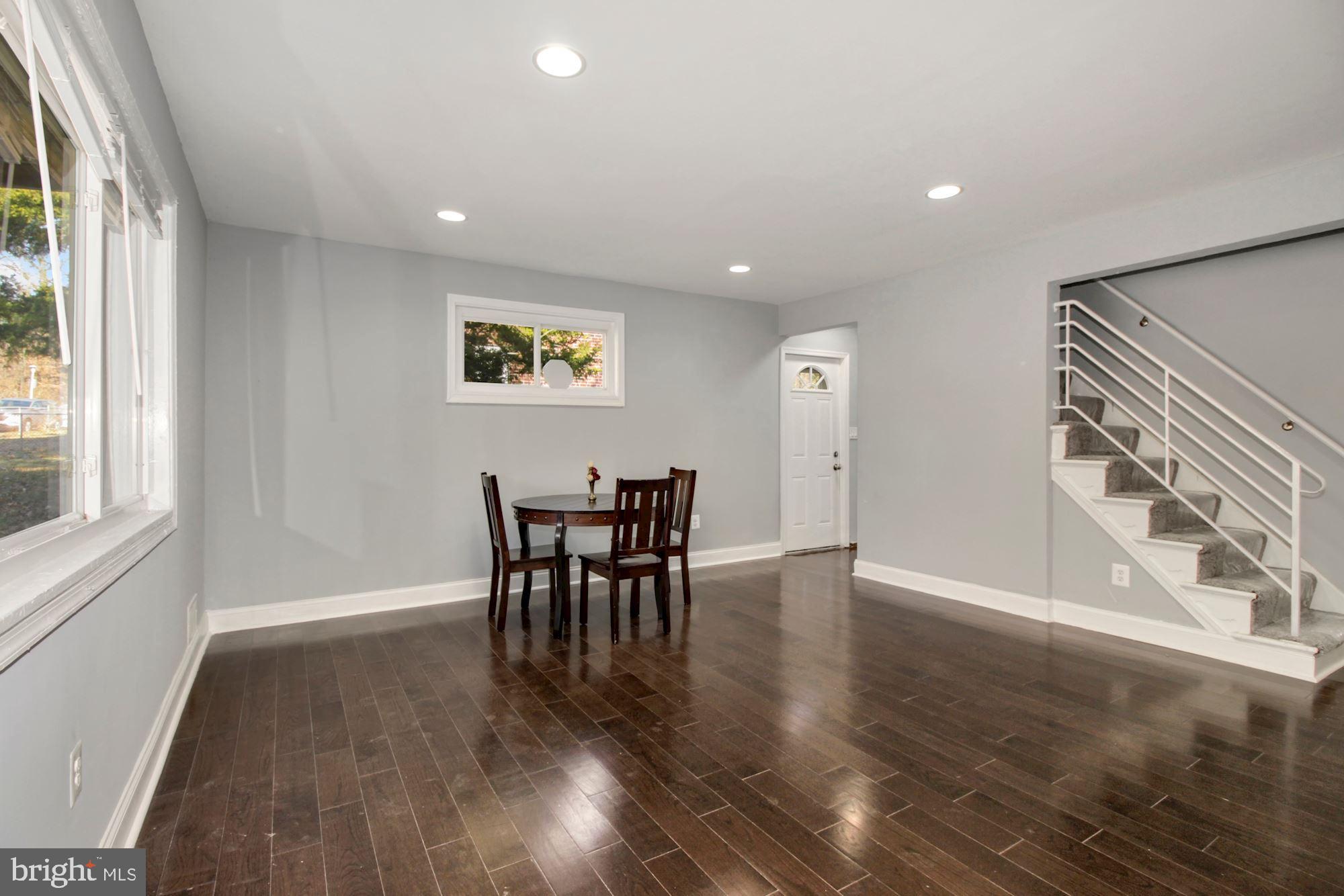 4309 Fairfax Road Baltimore, MD 21216 - Photo 3 of 33 Gleaming brand new hardwood floors