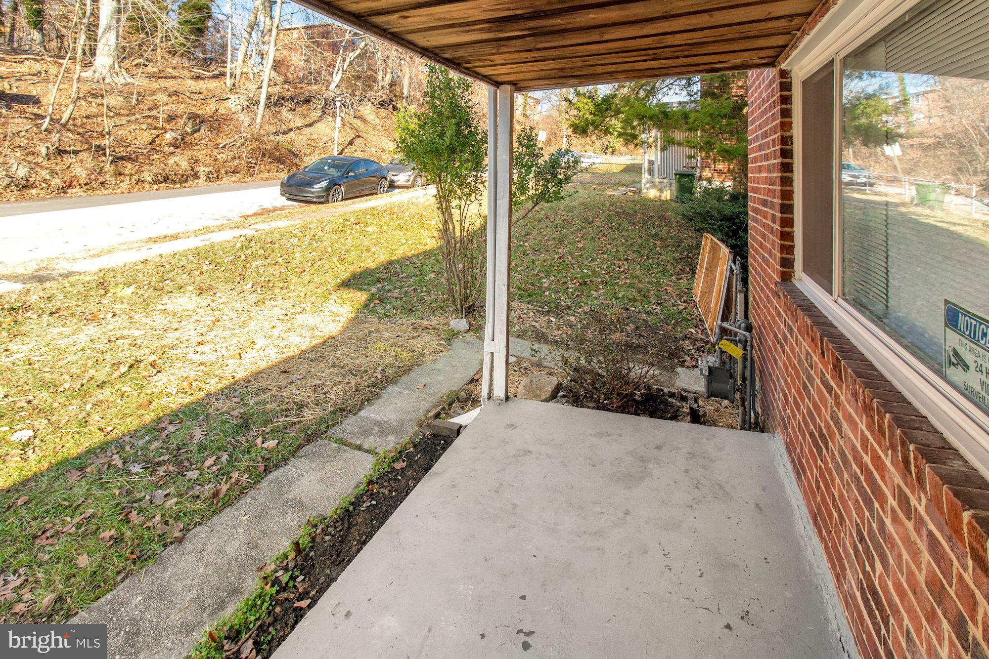 4309 Fairfax Road Baltimore, MD 21216 - Photo 33 of 33 Enjoy time outside on the front patio.