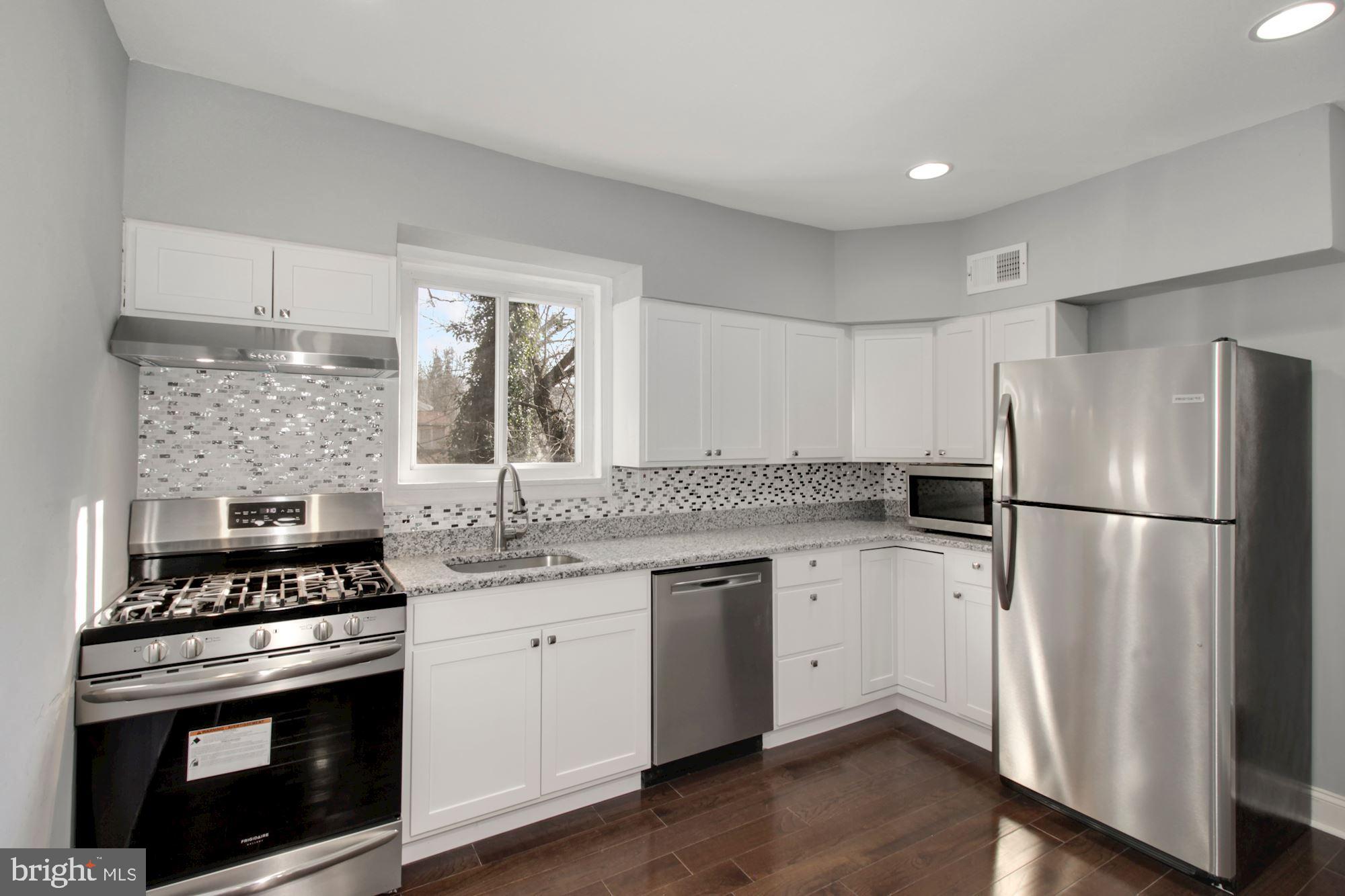 4309 Fairfax Road Baltimore, MD 21216 - Photo 7 of 33 Completely renovated kitchen.