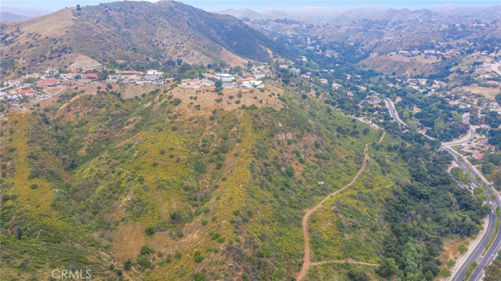 103 Flintlock Lane Bell Canyon, CA 91307 - Photo 14 of 18 a aerial view of a house with a yard