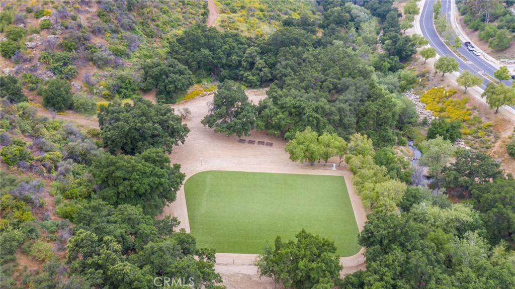 103 Flintlock Lane Bell Canyon, CA 91307 - Photo 15 of 18 an aerial view of a residential houses with outdoor space and trees all around
