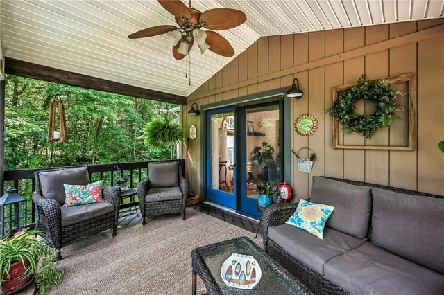 a outdoor living space with furniture and garden view