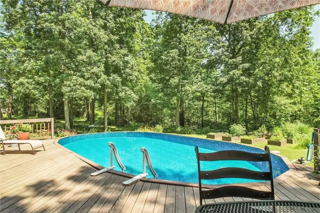 a view of a swimming pool with a patio