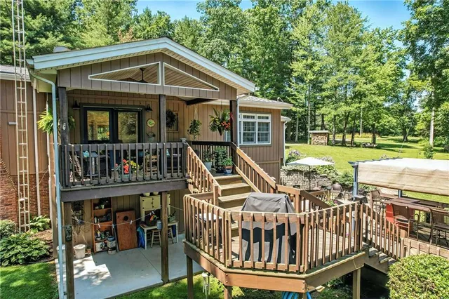 a view of a chair and table in the balcony