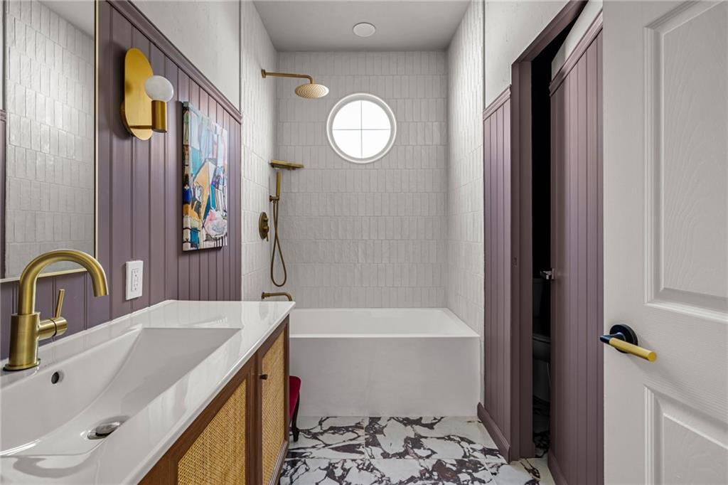 322 East Main Street Ligonier, PA 15658 - Photo 16 of 29 a bathroom with a sink a toilet and a bathtub