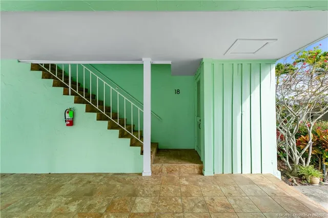 a view of entryway with stairs