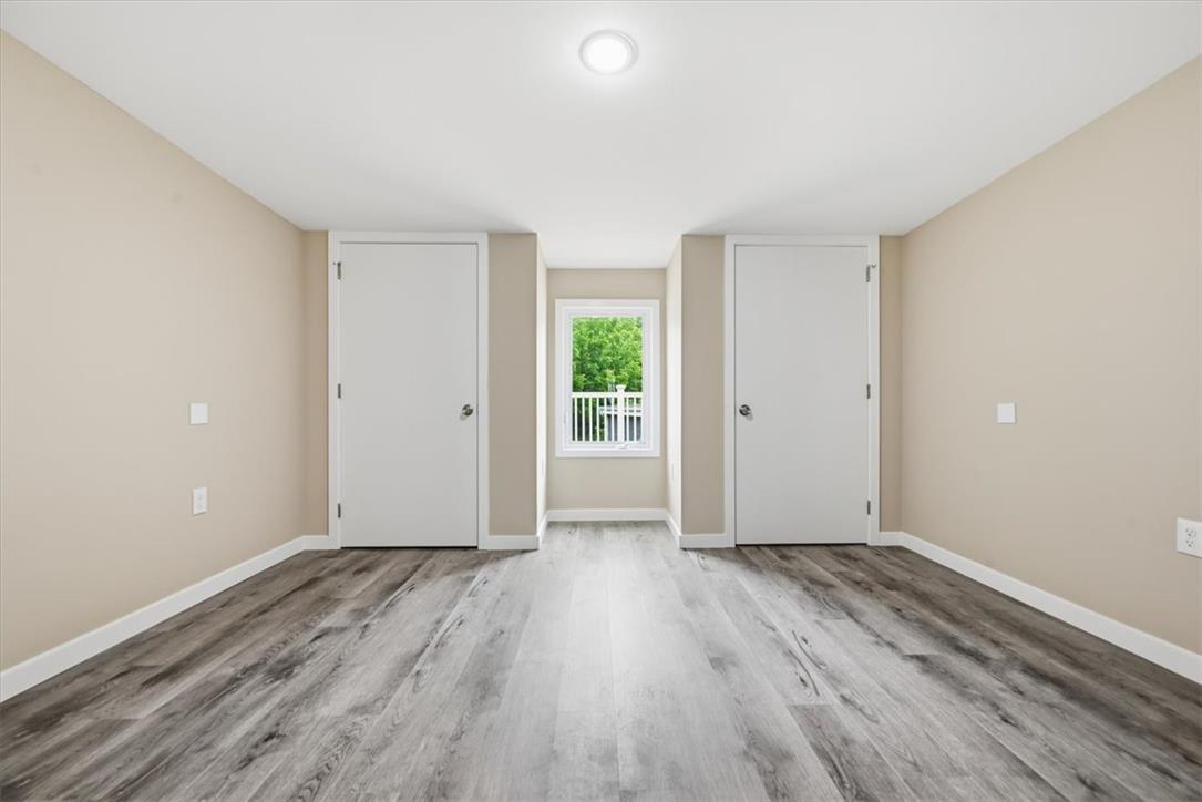 5641 North Coplay Road Whitehall, PA 18052 - Photo 24 of 68 Discover a naturally illuminated room boasting durable vinyl plank flooring and crisp white trim.