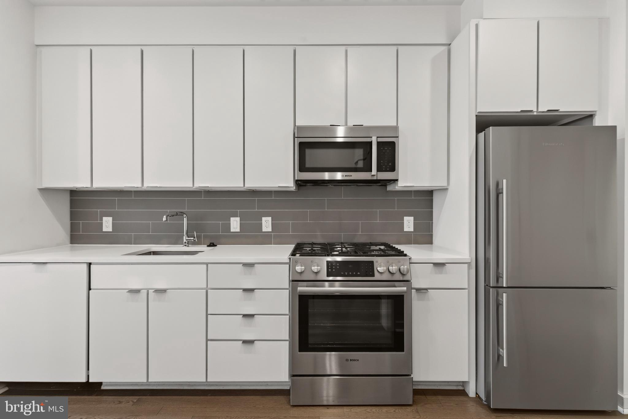 300 8th Street Northeast, Unit 209 Washington, DC 20002 - Photo 4 of 27 Hip well-laid out kitchen