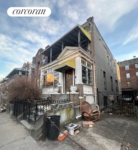 a view of a street with cars