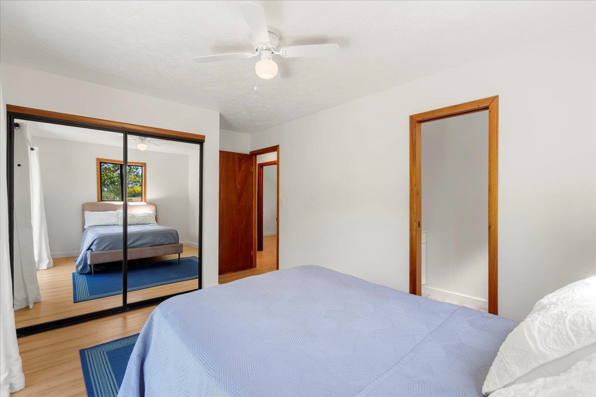 2130 Kauhikoa Road, Unit A Haiku, HI 96708 - Photo 19 of 43 a bedroom with a bed and a view of bedroom