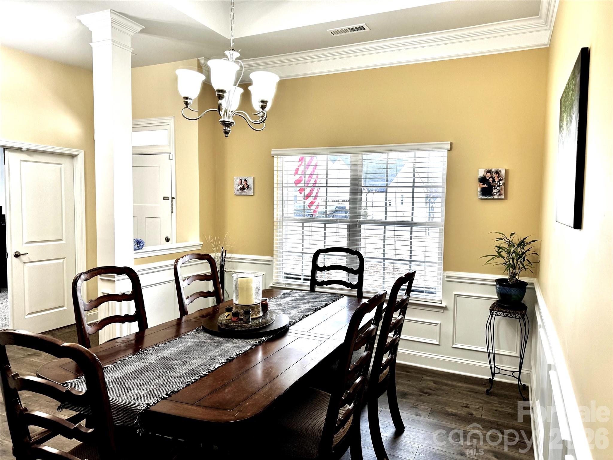 144 Sugar Hill Road Troutman, NC 28166 - Photo 4 of 18 a view of a dining room and a table and chairs
