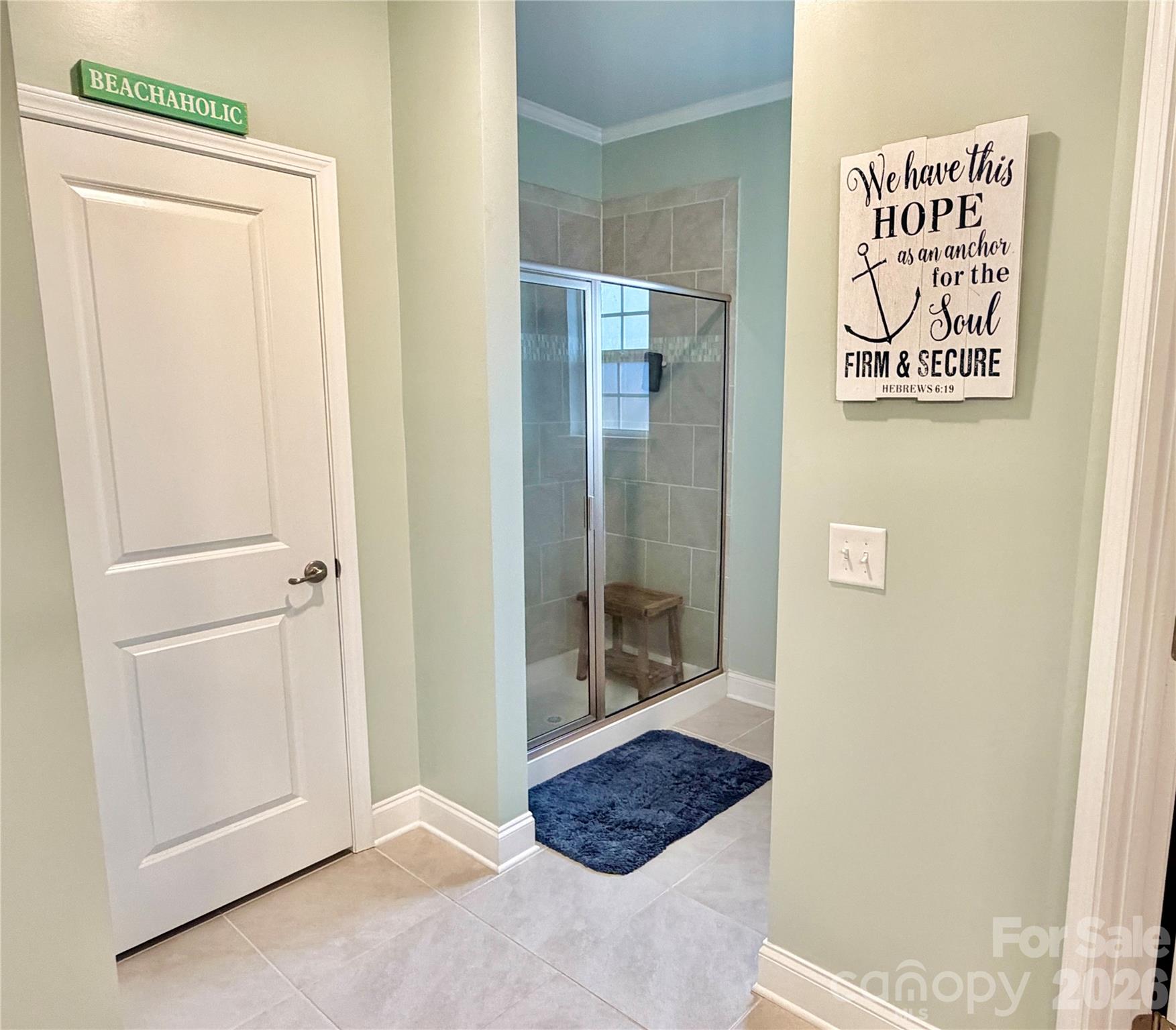 144 Sugar Hill Road Troutman, NC 28166 - Photo 10 of 18 a bathroom with a shower and a sink