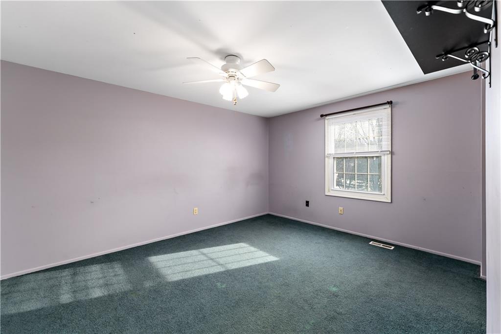 1523 Hastings Mill Road Pittsburgh, PA 15241 - Photo 25 of 50 an empty room with windows and fan