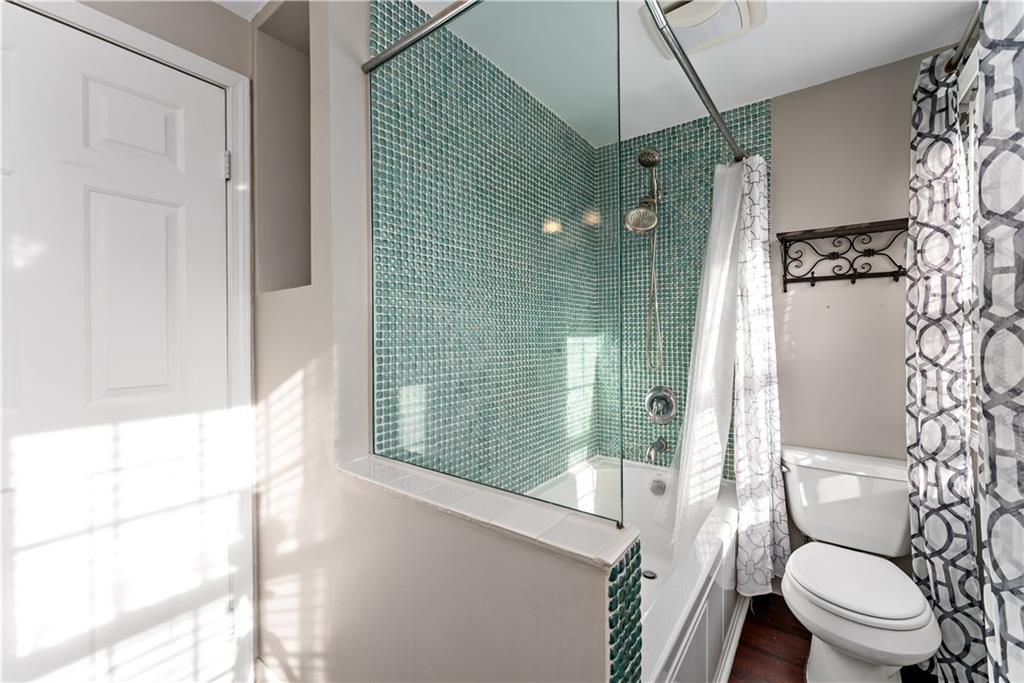 1523 Hastings Mill Road Pittsburgh, PA 15241 - Photo 28 of 50 a bathroom with a toilet a sink and shower