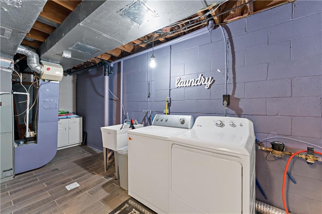1523 Hastings Mill Road Pittsburgh, PA 15241 - Photo 35 of 50 a utility room with dryer and washer