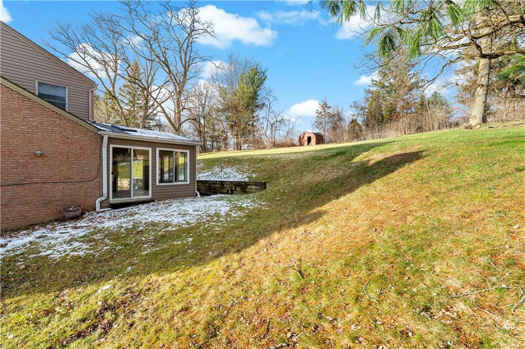 1523 Hastings Mill Road Pittsburgh, PA 15241 - Photo 36 of 50 a view of a house with backyard and tree