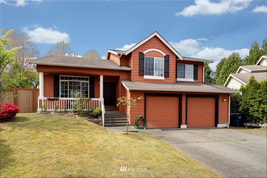 13404 Elk Ridge Road Southeast Monroe, WA 98272 - Photo 1 of 30 a front view of a house with a yard