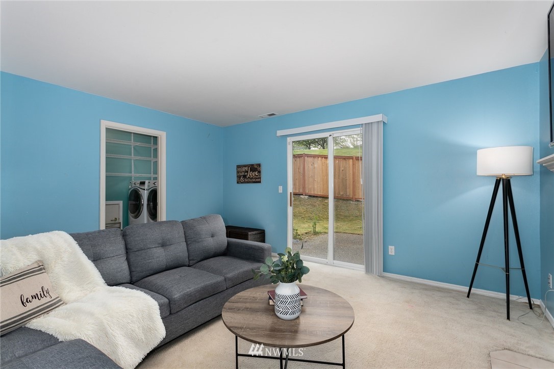13404 Elk Ridge Road Southeast Monroe, WA 98272 - Photo 14 of 30 a living room with furniture and a window
