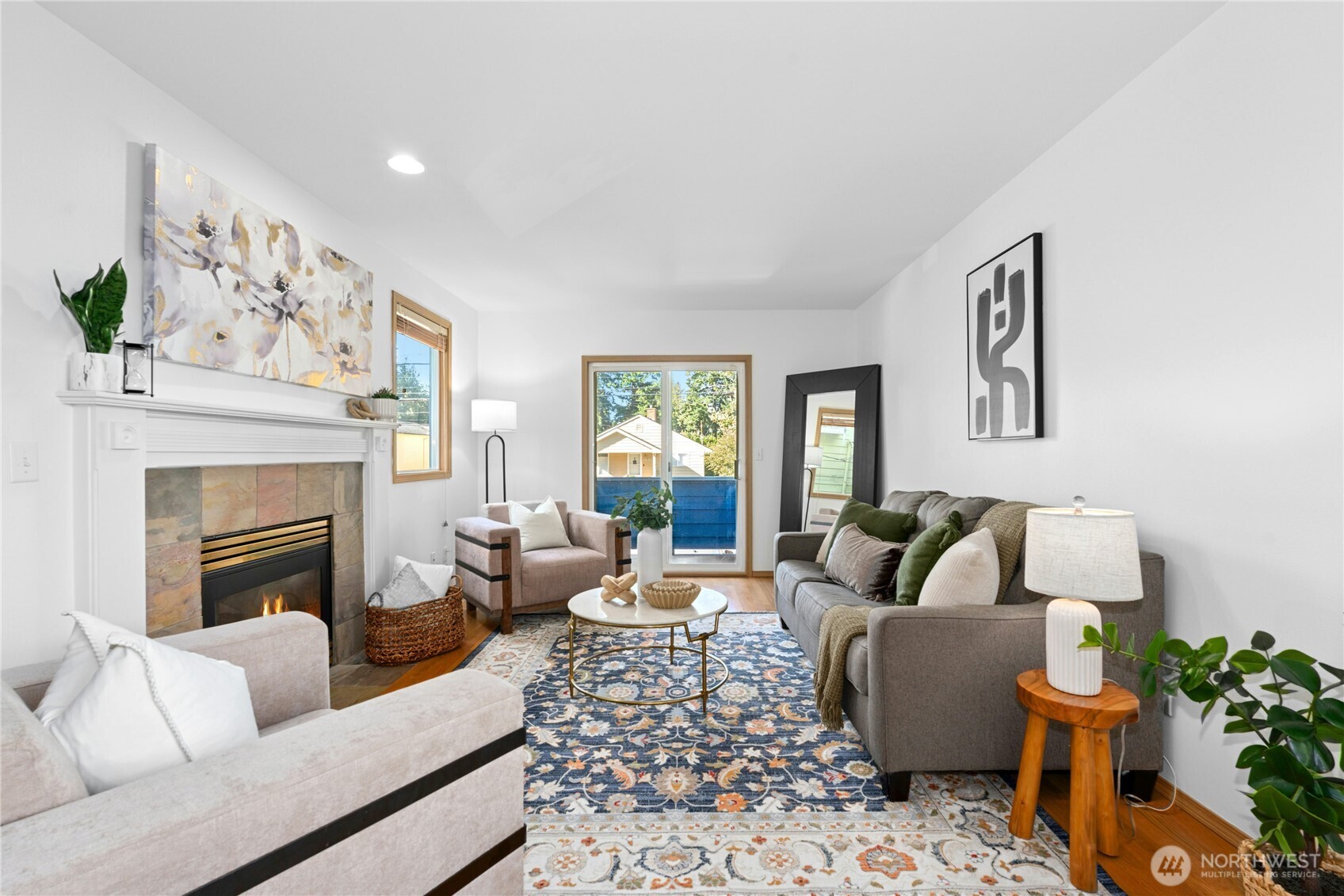 14348 Wallingford Avenue North Seattle, WA 98133 - Photo 2 of 28 a living room with furniture and a fireplace