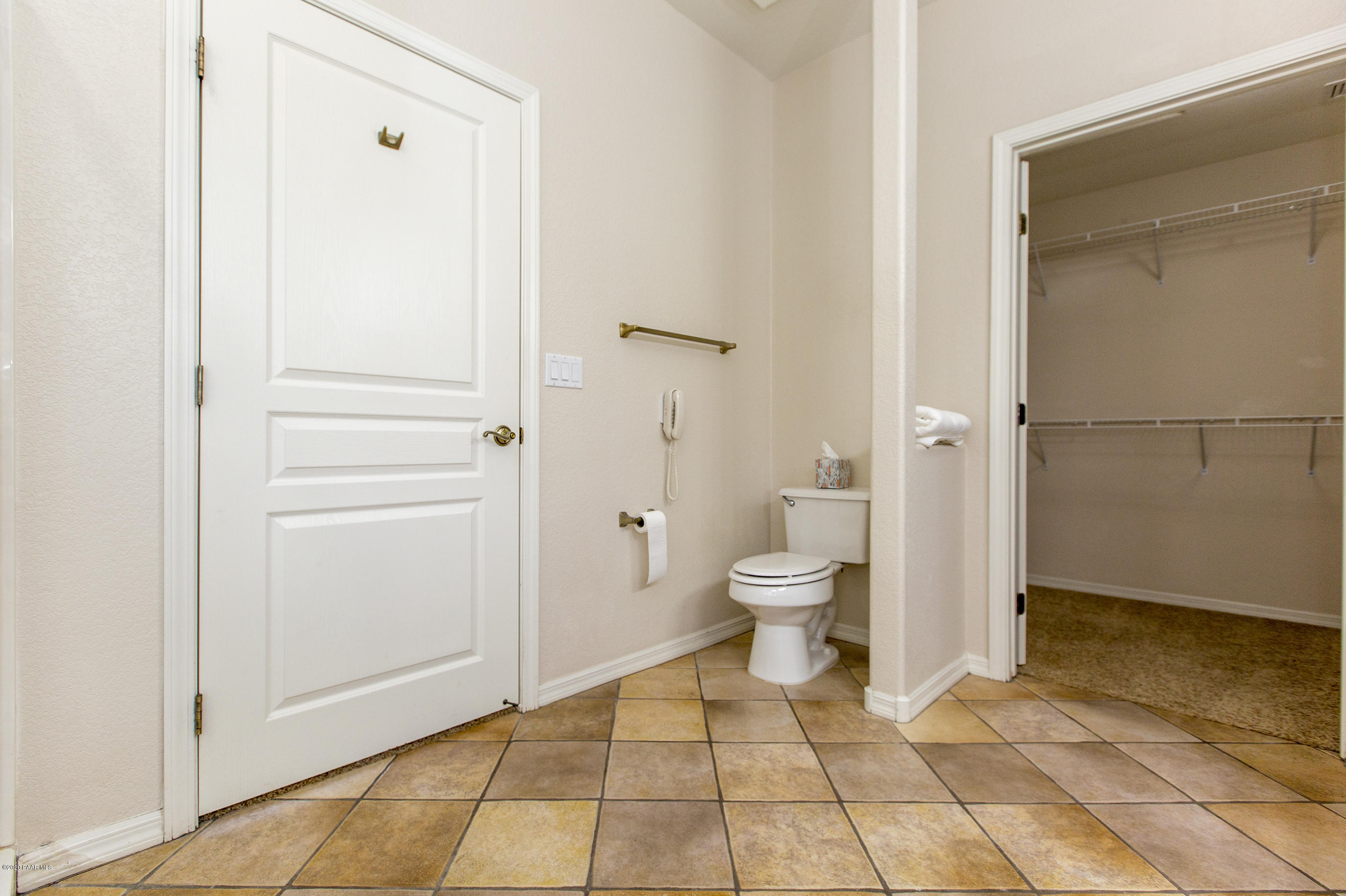 1716 Alpine Meadows Lane, Unit 403 Prescott, AZ 86303 - Photo 19 of 39 a bathroom with a toilet and a shower