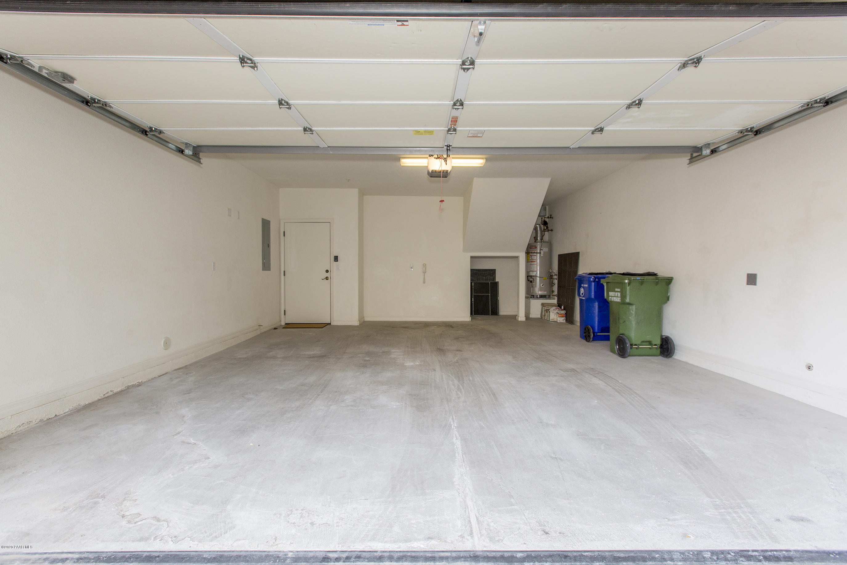 1716 Alpine Meadows Lane, Unit 403 Prescott, AZ 86303 - Photo 31 of 39 a view of a livingroom with a ceiling fan