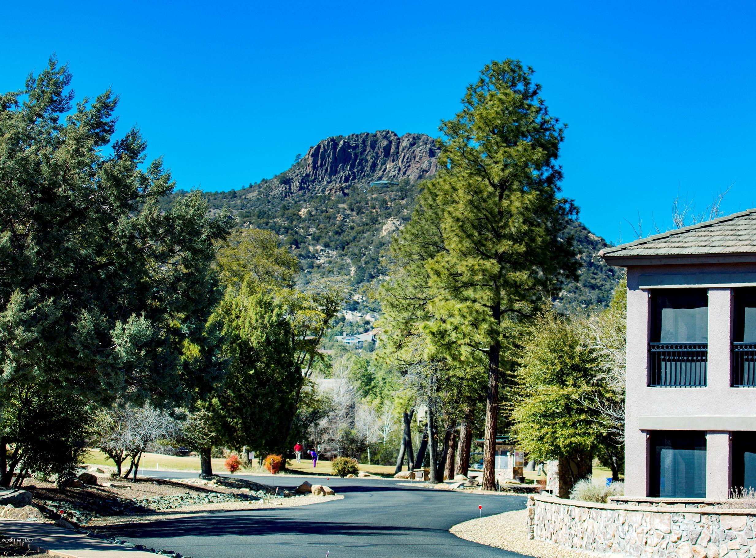 1716 Alpine Meadows Lane, Unit 403 Prescott, AZ 86303 - Photo 35 of 39 a view of a garden with trees