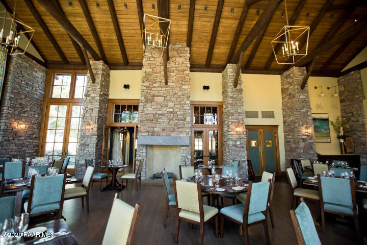 1716 Alpine Meadows Lane, Unit 403 Prescott, AZ 86303 - Photo 38 of 39 a view of a dining room with furniture