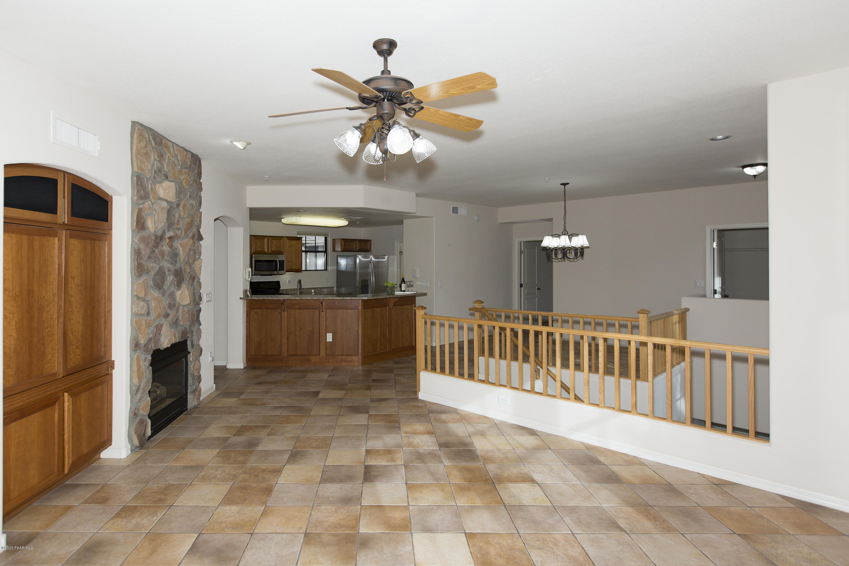 1716 Alpine Meadows Lane, Unit 403 Prescott, AZ 86303 - Photo 6 of 39 a view of a kitchen with a sink and a window